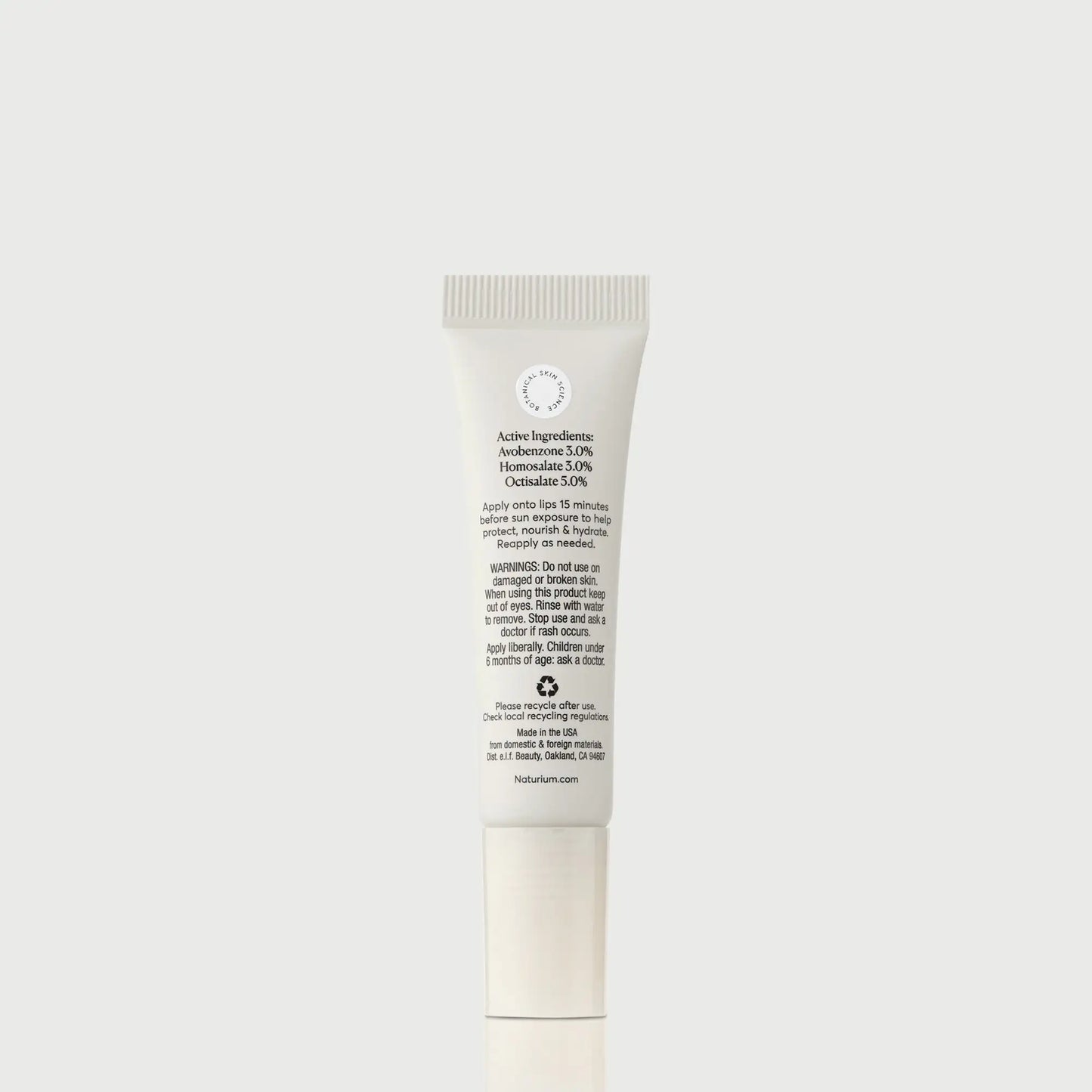 phyto-glow-lip-balm-spf-45-clear-l1 NATR-10124_PhytoGlow_SPF_Clear_primary_capon_back_bonebkgd_1.webp